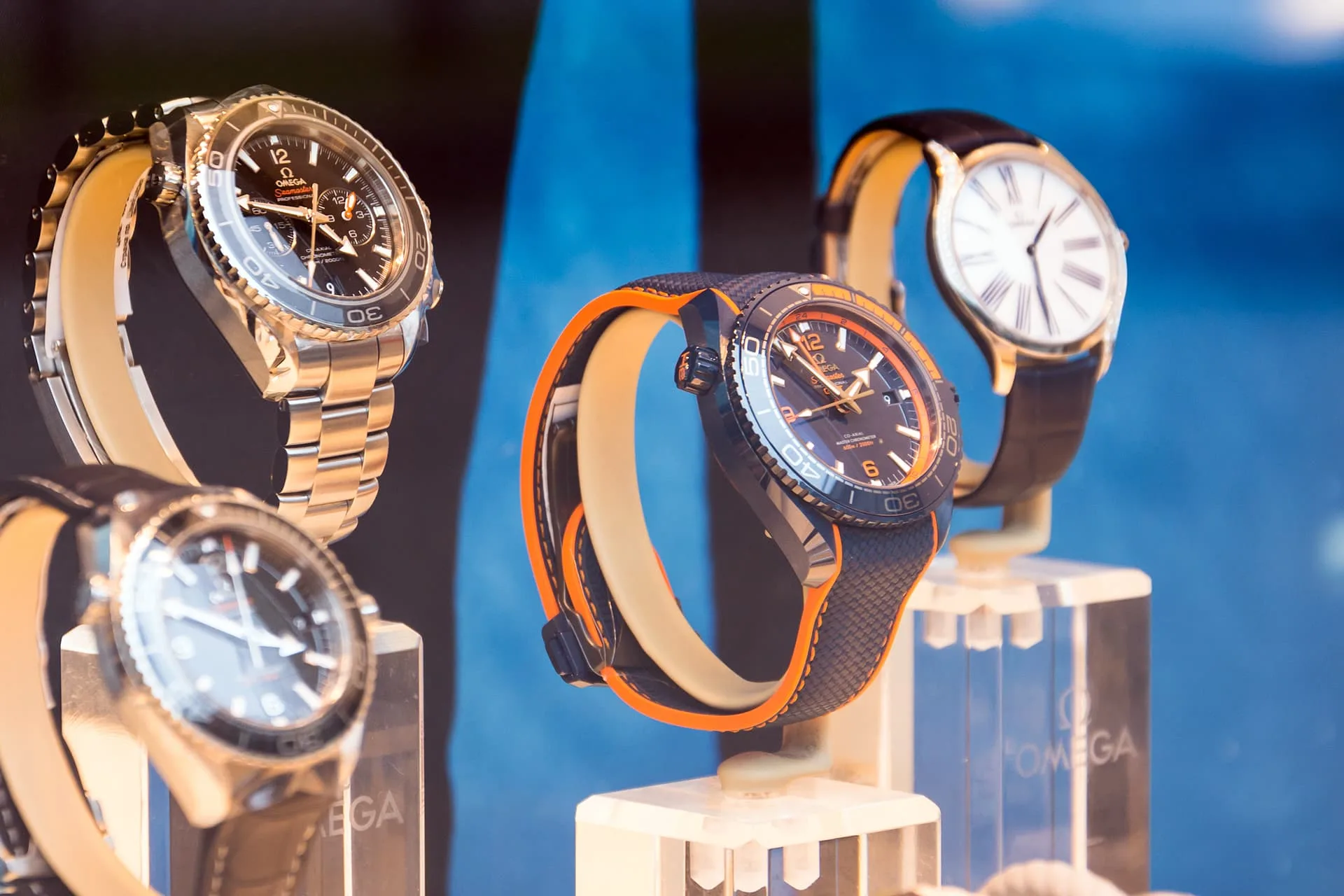 Four Omega luxury watches on display