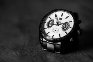 Close up view of a Tag Heuer luxury watch with a white face