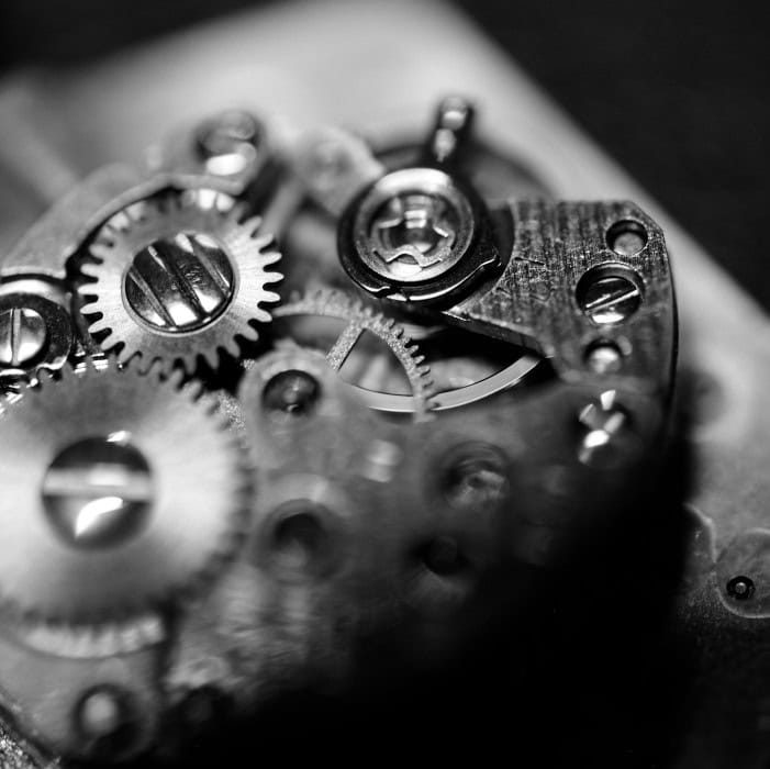 watch9 r1gts6ibrl0nh66gruczkkt4me9purq90z28kag1aw - Genco Timepieces Macro photograph of the inner workings of a watch